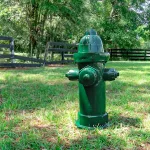 full sized replica fire hydrant dated 1904 in green