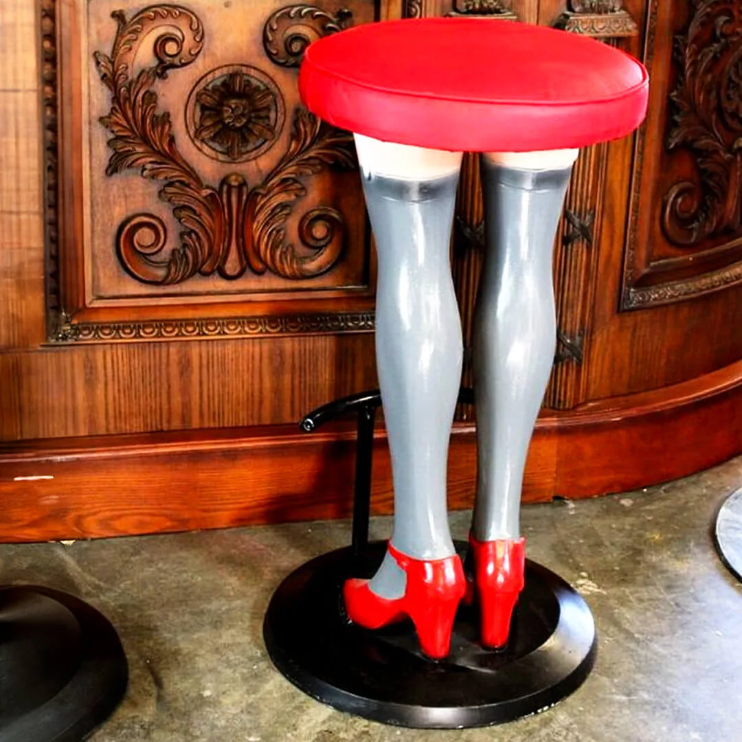 pair of girls legs bar stools with high heels and stockings