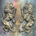 pair of wall mounted royal lion crest sculptures