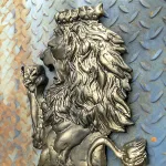 pair of wall mounted royal lion crest sculptures