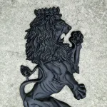 pair of wall mounted royal lion crest sculptures
