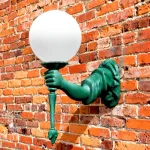 statue of liberty torch bearing arm wall sconce