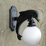 wall mounted dolphin sconce for indoor or outdoor use