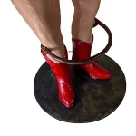 pair of cow girl bar stools with red polka dot bikini