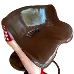 pair of cow girl bar stools with red polka dot bikini