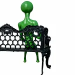 sitting alien statue drinking aluminum glow in dark