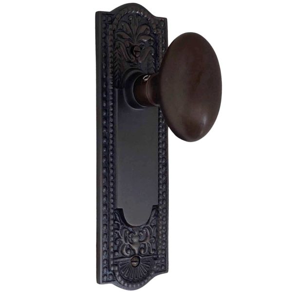 the orlean passage set in bronze finish with oval door knobs