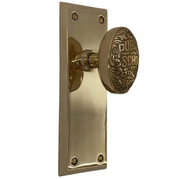 the century dummy set in polished brass with new york door knobs