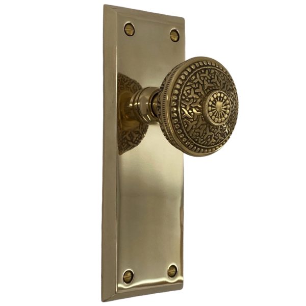 the century dummy set in polished brass with rice door knobs