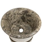 cone shaped pedestal sink with dark grey granite marble