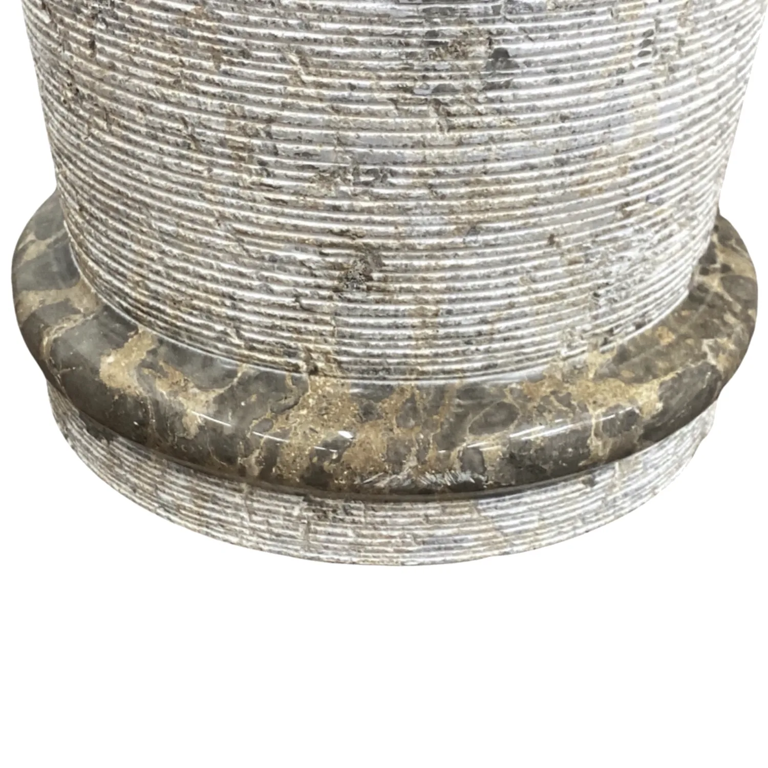 cone shaped pedestal sink with dark grey granite marble