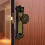 the classic passage set in highlighted bronze select door knobs