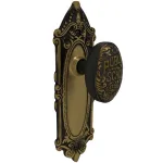 the milford dummy set in highlighted bronze select door knobs