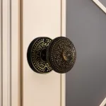 rice round rosette passage set in highlighted bronze select door knobs