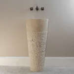 modern ribbed cone pedestal sink in marble stone