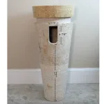 modern ribbed cone pedestal sink in marble stone