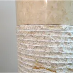 modern ribbed cone pedestal sink in marble stone