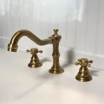 victoriana cross handle faucet with 8 inch centers antique brass
