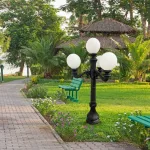 pair of 4 arm pole light street fixtures for outdoors 10 or 12 inch ball shade