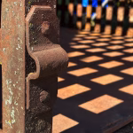real antique rusted iron jail cell prison with fold up bed western holding cell