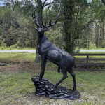 elk statue on rocks 10 foot bronze painted aluminum – left facing