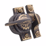 victorian style window sash lock in hand highlighted bronze with sundial design