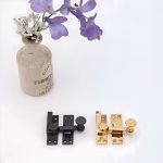 swinging window sash lock in brass