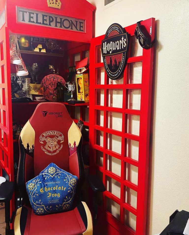 Customer Showcase Customer photo of a red telephone booth from The Kings Bay styled as a Hogwarts-themed reading nook