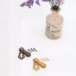 ribbed swivel keyhole escutcheon in cast solid brass