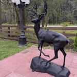 Stag Deer Statue on Rock Base Cast Aluminum Painted Buck Sculpture 67 Inches, side view
